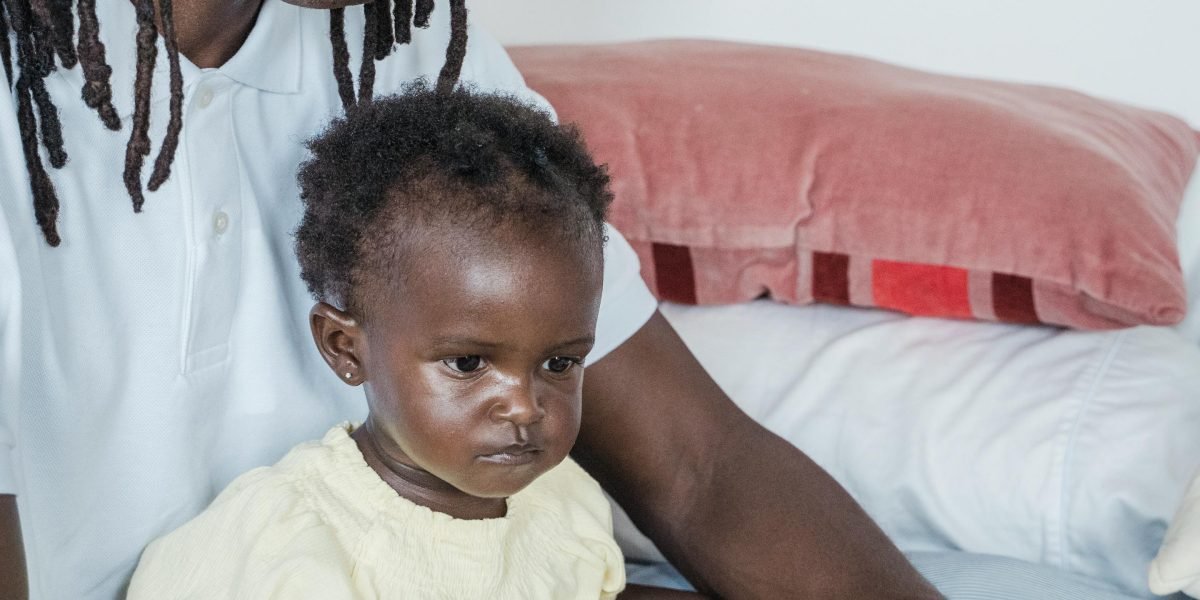 A parent and child sharing a moment of joyful storytime, reflecting deep connection.