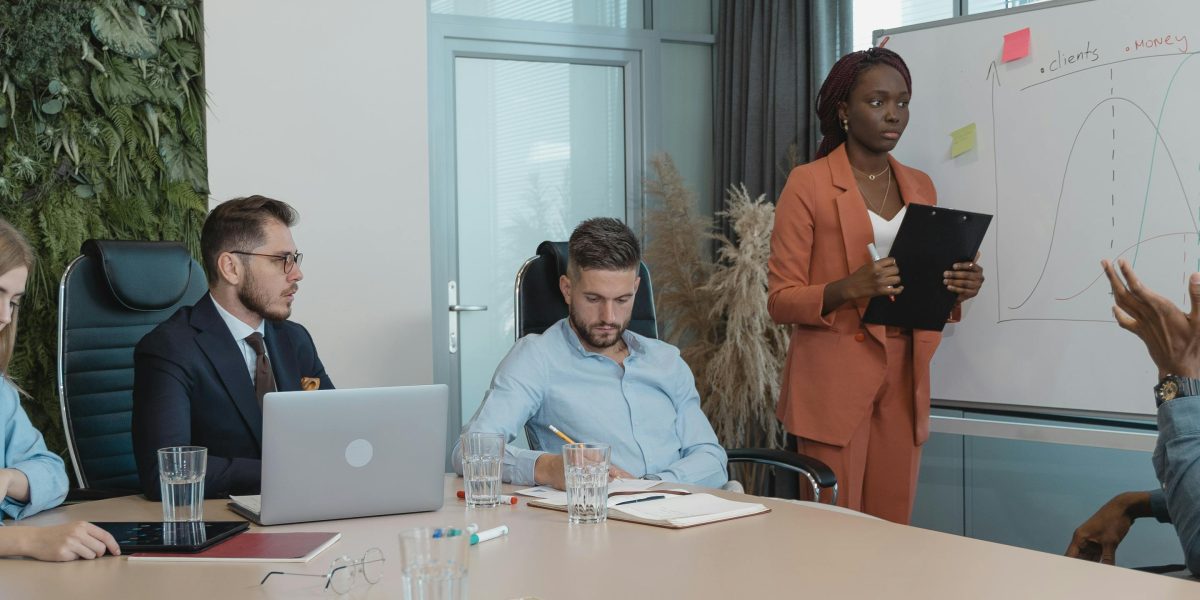 A diverse team collaborating to solve a complex problem, reflecting the partnership and ingenuity in 'Project Hail Mary'.