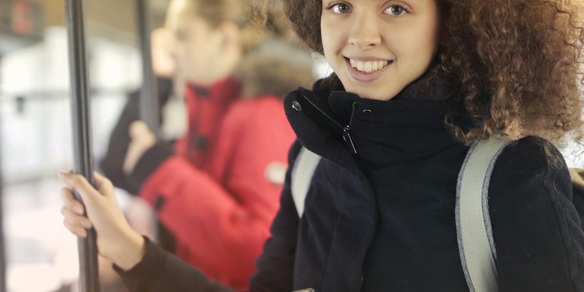 A scene depicting a person reading a book on their commute, highlighting how fast-paced novels fit into modern, busy lifestyles.