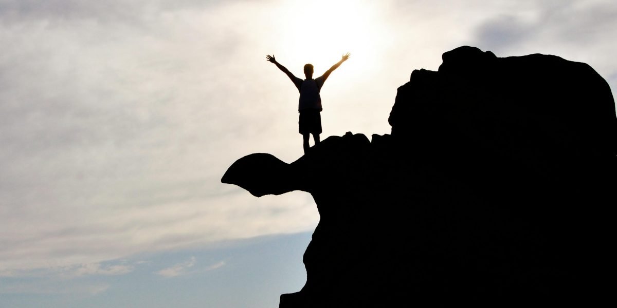 A person confidently navigating challenges, reflecting the triumph over reading discovery barriers.